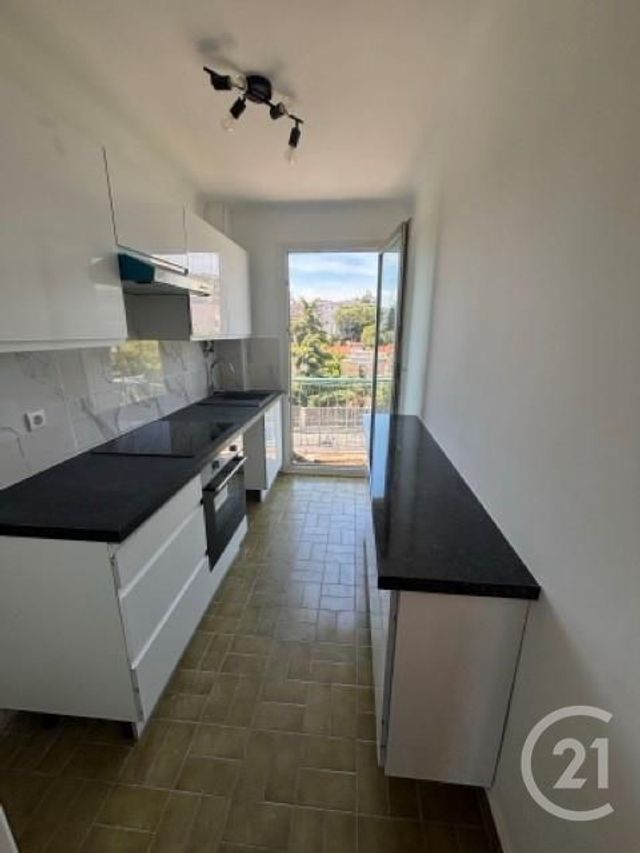 Appartement F3 à louer - 3 pièces - 52.45 m2 - NICE - 06 - PROVENCE-ALPES-COTE-D-AZUR - Century 21 Gilles Bossé Immobilier